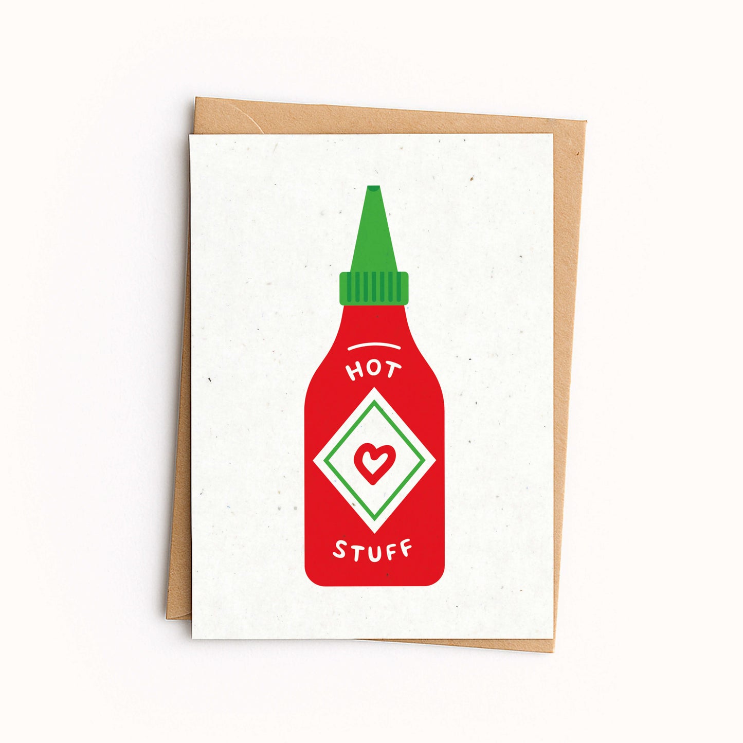 Greeting card with a red hot sauce bottle design on a white background. Card reads 'Hot Stuff'.