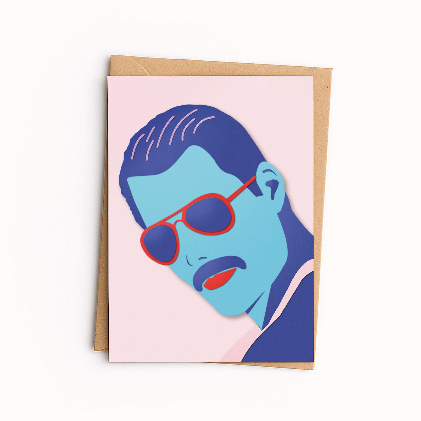 Greeting card with a stylized illustration of Freddie Mercury on a pink background