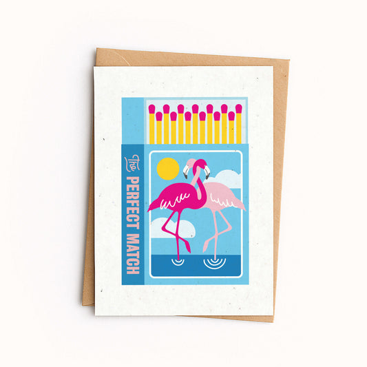 Greeting card with flamingo design and matchbox illustration on a white background